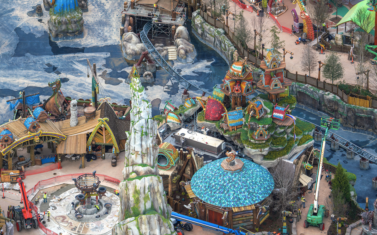 Berk village hill with houses and dragon houses