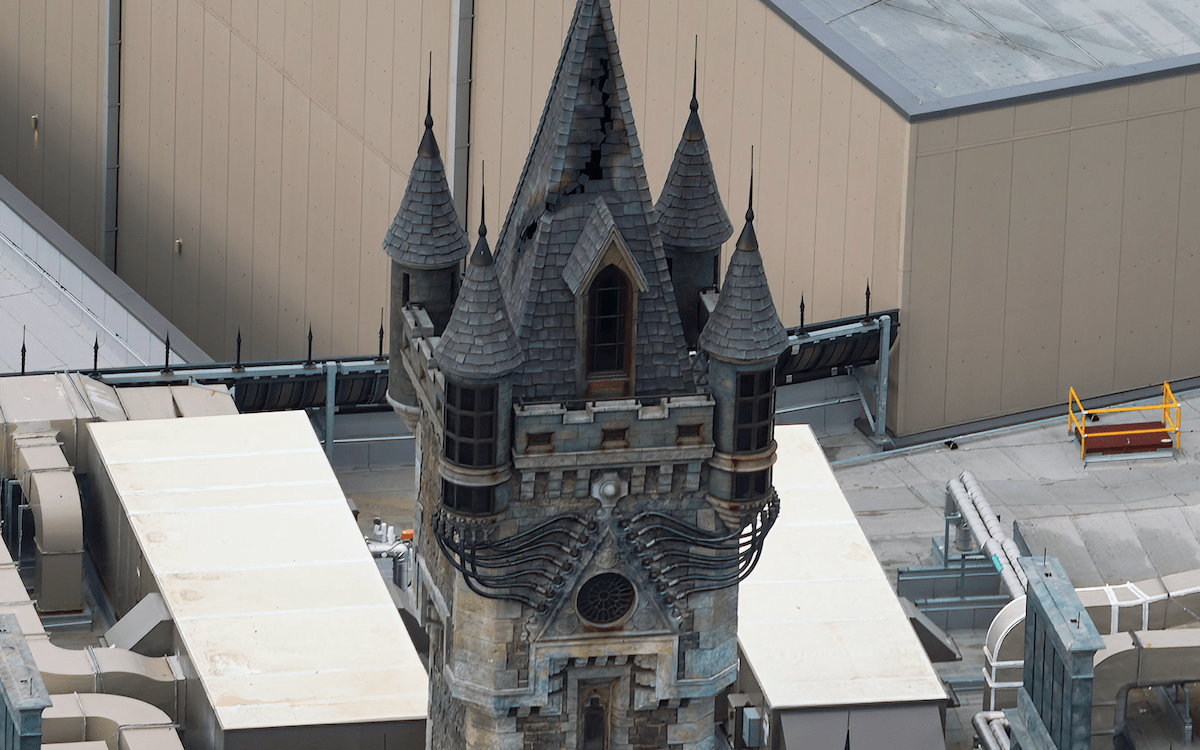 Frankenstein Manor tower with electricity lighting off, Epic Universe